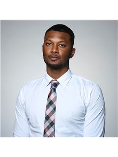 Wil Logan - RE/MAX Compass