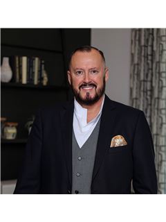 Guillermo H. Martinez - RE/MAX Signature