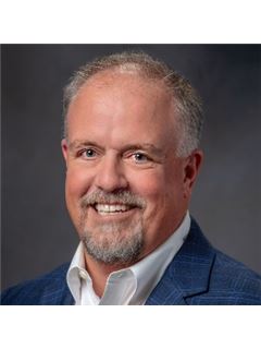 James R. Tomberlin - RE/MAX Grand