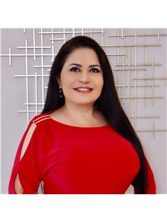 Laura A. Bello - RE/MAX Partners
