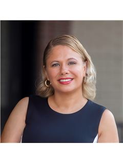 Carmen Ramos - RE/MAX Partners