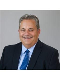Paul L. Archibald - RE/MAX Grand