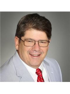 Schuyler Carlos Pulford - RE/MAX Signature