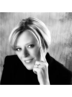 Kay Wright - RE/MAX Universal