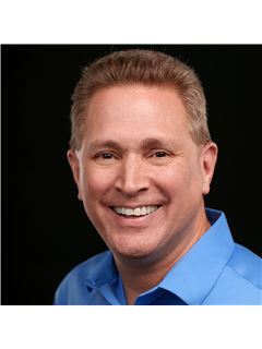 James E. McCrate - RE/MAX ONE