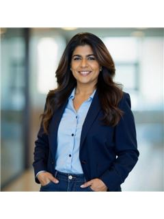 Manuja Gilleland - RE/MAX Partners
