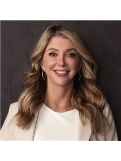 Tracie A. Martin, CPA - RE/MAX Universal