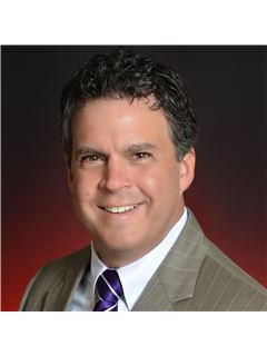 John G. Cope - RE/MAX Universal