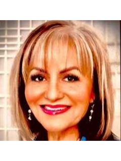Cruz Garcia - RE/MAX Partners