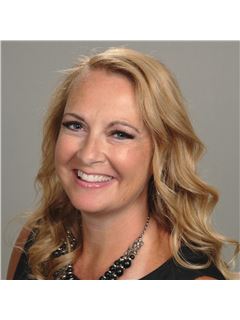 Cara Dulaitis - RE/MAX 10