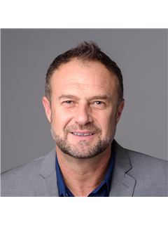 Damian Ciszek - RE/MAX 10