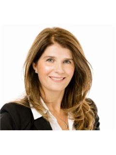 Christine M. Fischer - RE/MAX 1st Service