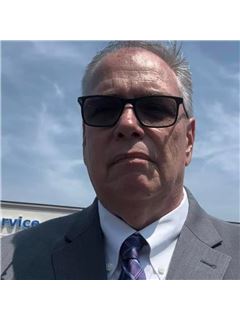 Carl Guzzy - RE/MAX 1st Service