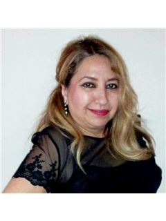 Mireya Rogoz-Bedore - RE/MAX 10