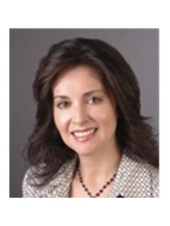 Mina Muñoz - RE/MAX 10