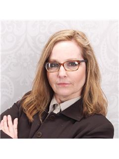 Debra A. Johnston - RE/MAX 10