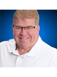 Carl R. Bohne - RE/MAX 1st Service