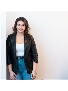 Maribel Gutierrez - RE/MAX 10