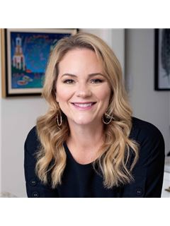 Melanie Roman - RE/MAX 1st Service