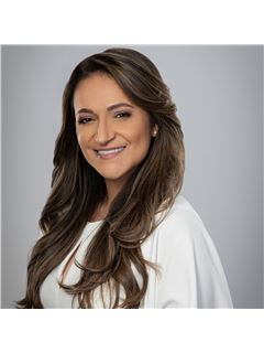 Lucy Chavez - RE/MAX Plaza