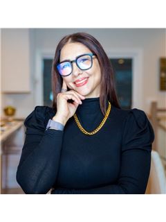 Nickola Wells - RE/MAX Premier