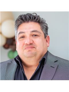 Eliseo Guzman - RE/MAX 10