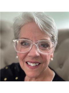 Laura F. Swinden - RE/MAX Suburban