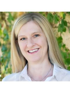 Tracy McGinnis - RE/MAX Professionals Select