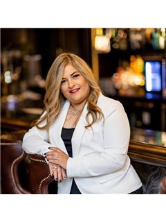 Maria E. Casas - RE/MAX 1st Service