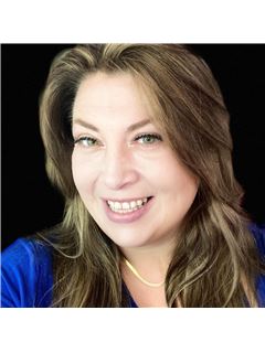 Carrie J. Smith - RE/MAX Modern Realty