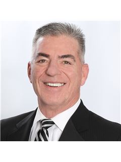 Directeur d'agence - Michael A. Luzzi - RE/MAX House Values