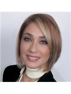 Nilsa Martinez - RE/MAX First Realty II