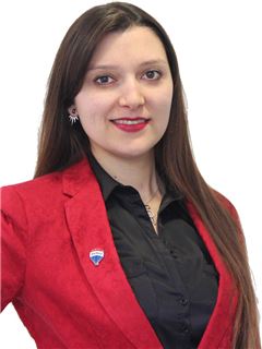 Gabriela Sarmiento - RE/MAX - FIRST