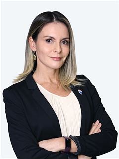 Claudia Valenzuela - RE/MAX - CENTRAL