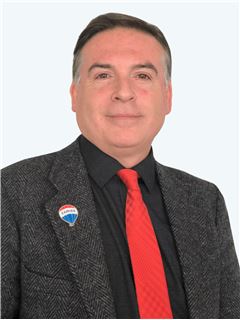 Adolfo Zarges - RE/MAX - CENTRAL