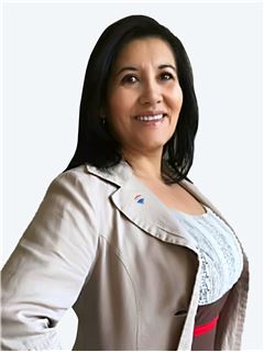Paola Cisternas - RE/MAX - CLASS