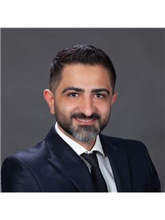 Moe Entezar - RE/MAX Masters Realty
