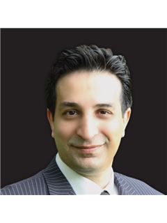 Razee Oskuei - RE/MAX Masters Realty