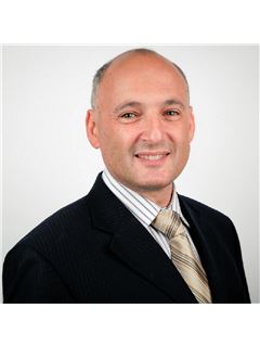 Yuriy Fleysher - RE/MAX Excellence