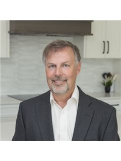 Gary V. Becker - RE/MAX Treeland Realty