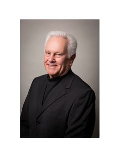 Clifford E. Wenger - RE/MAX Vernon