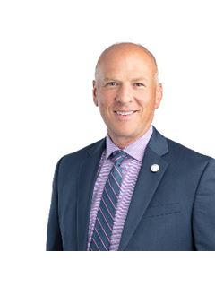 Mark E. Dana - RE/MAX Treeland Realty