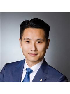 Shujie Wang - RE/MAX Crest Realty