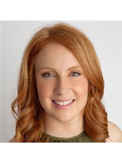 Julia Connolly - RE/MAX Masters Realty