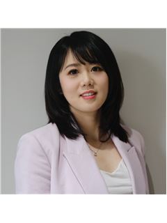 Bina Guan - RE/MAX Crest Realty