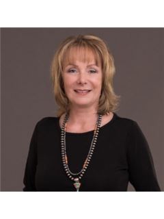 Karren Winther - RE/MAX Treeland Realty