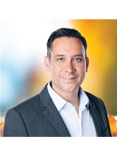 Bryan Coombes - RE/MAX Treeland Realty