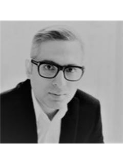 Mohammad Bahrainian - RE/MAX Masters Realty