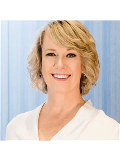Dora Bergen - RE/MAX Masters Realty