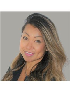 Kris Trajano - RE/MAX River City